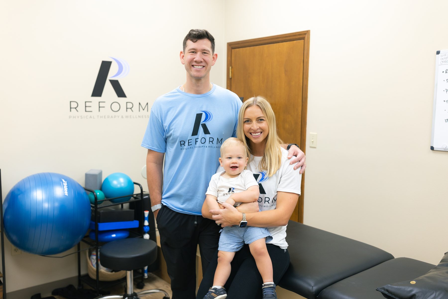 Dr. Dana LaPeze with her husband Cory and their son JD at Reform Physical Therapy and Wellness